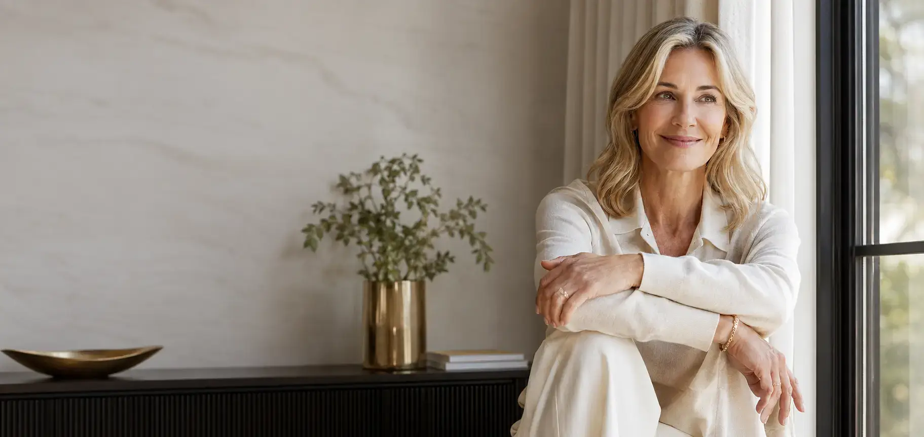 Confident mature woman in an elegant precision-wellness setting